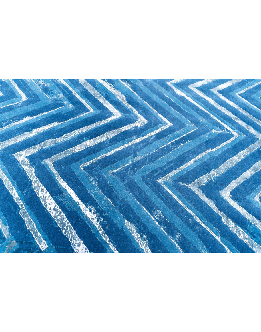 F U R L A luxury handmade rug by Cherom in blue New Zealand wool with modern zigzag design.