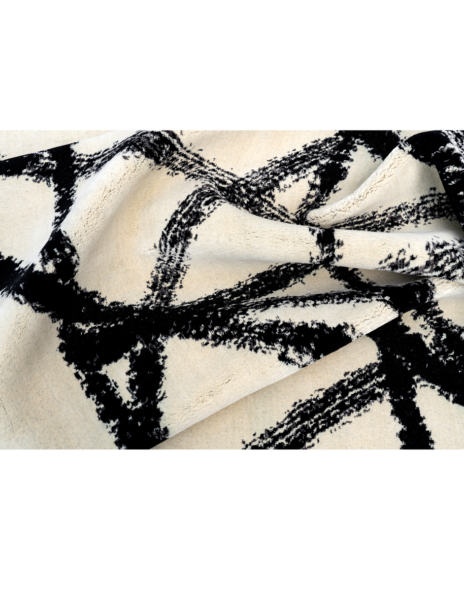 S A C A I luxury handmade rug by Cherom, New Zealand wool, contemporary design, black and white pattern.