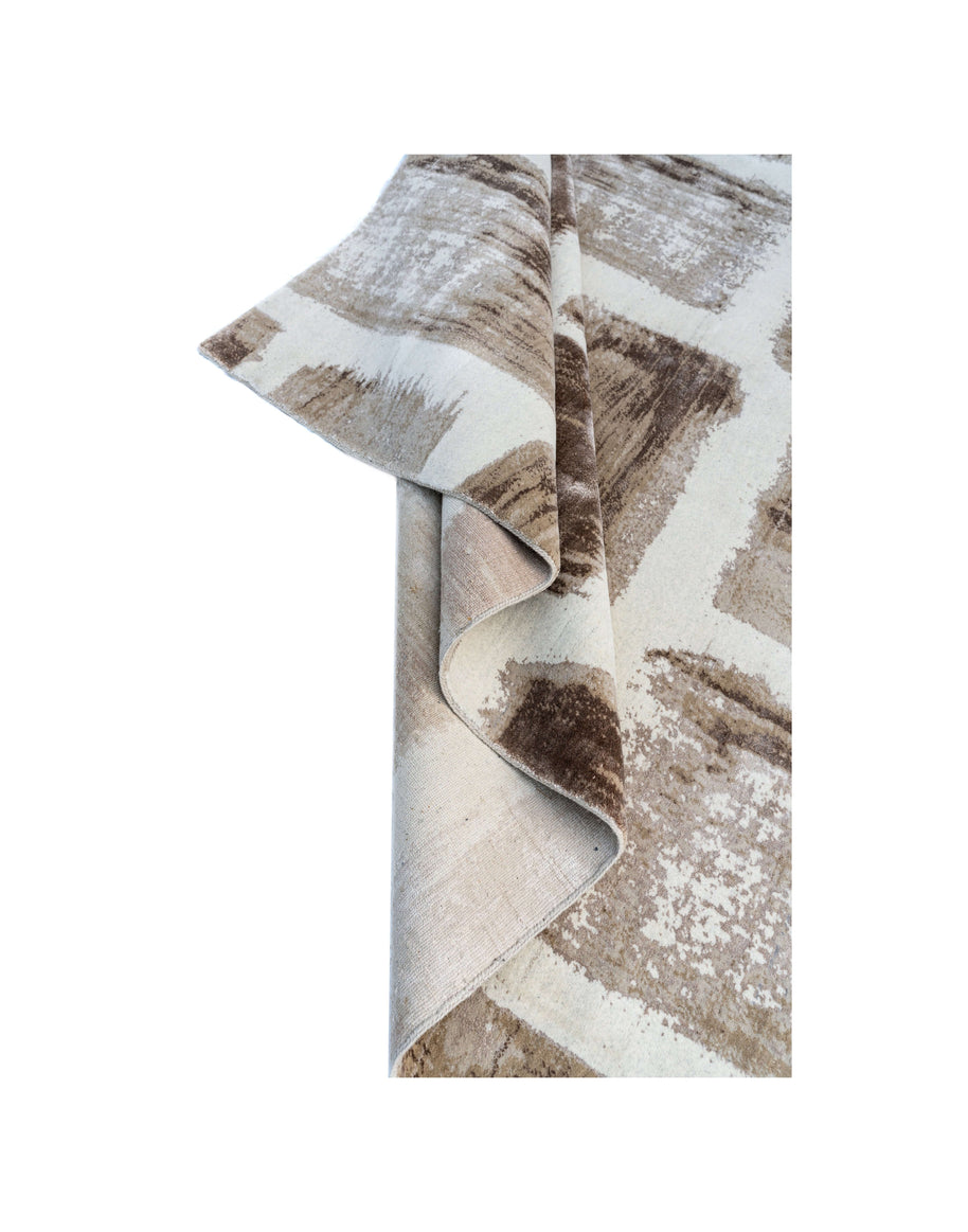 S E I D E L luxury handmade rug by Cherom in neutral New Zealand wool with contemporary brushstroke design.