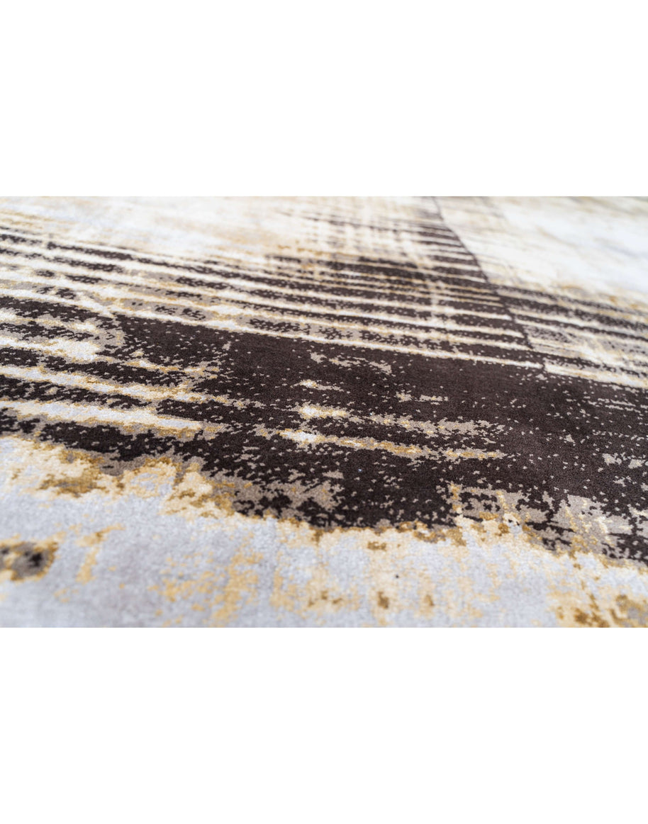 L Y M A N luxury handmade rug by Cherom in dark brown and gold tones, made from New Zealand wool.