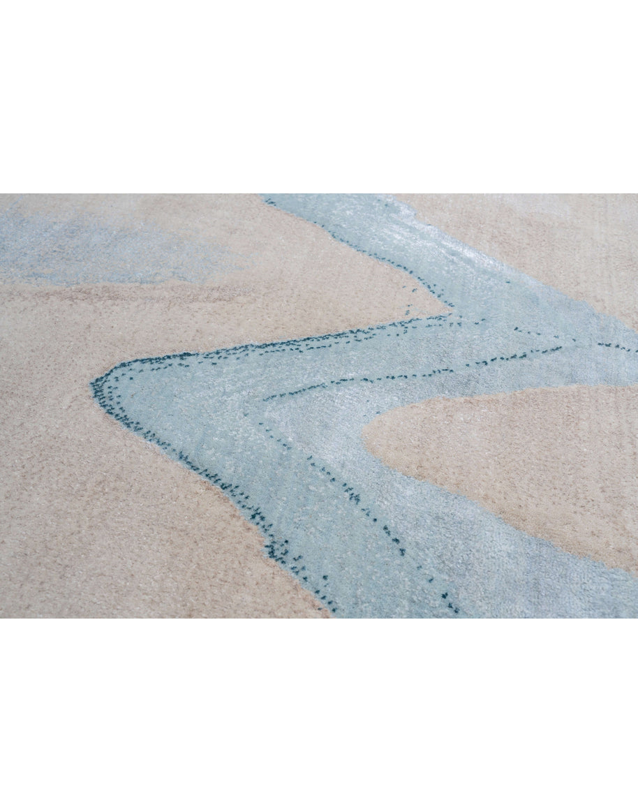 M O D E N A luxury handmade rug by Cherom, featuring New Zealand wool in a modern design with blue accents.