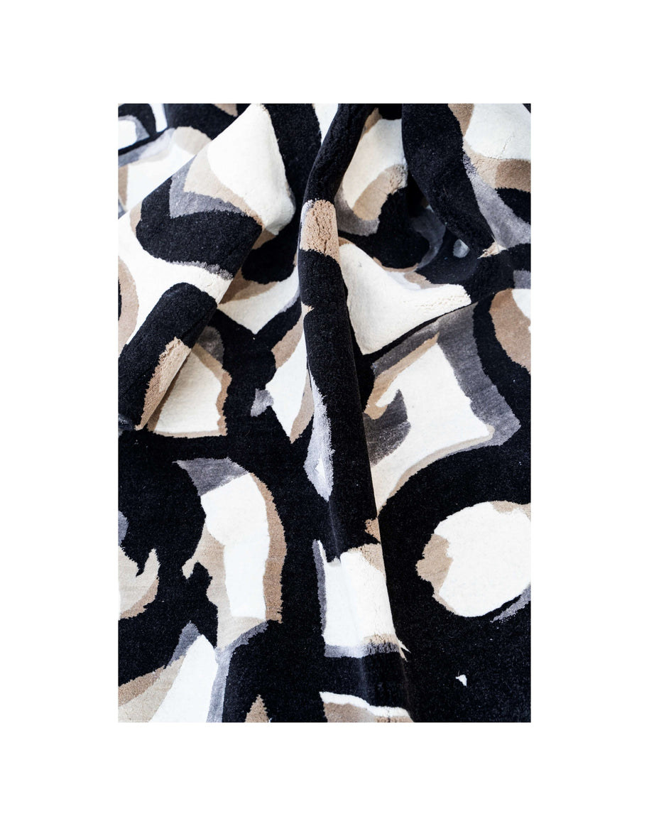 L A   R O U T E luxury handmade rug by Cherom, black and beige New Zealand wool, modern contemporary design.
