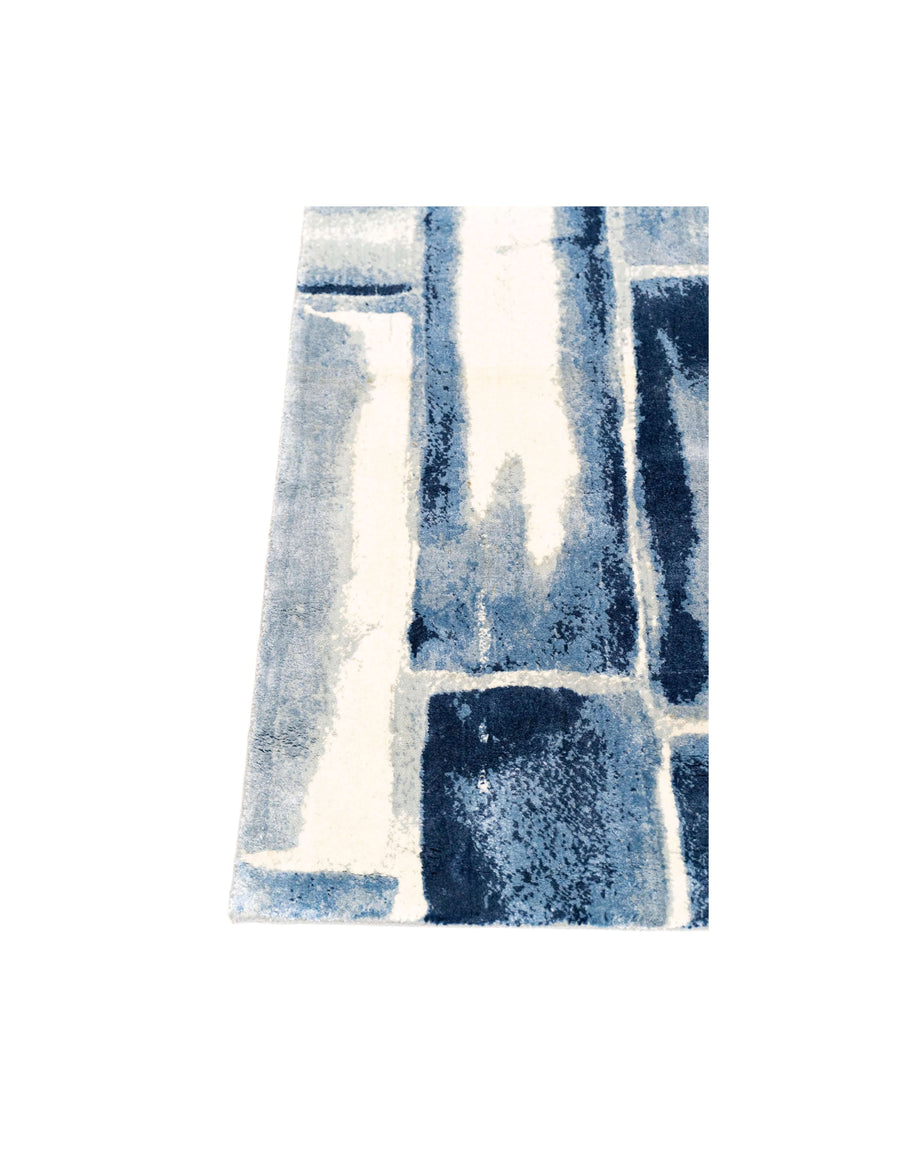 L O U I S luxury handmade rug by Cherom in blue New Zealand wool, modern abstract design.