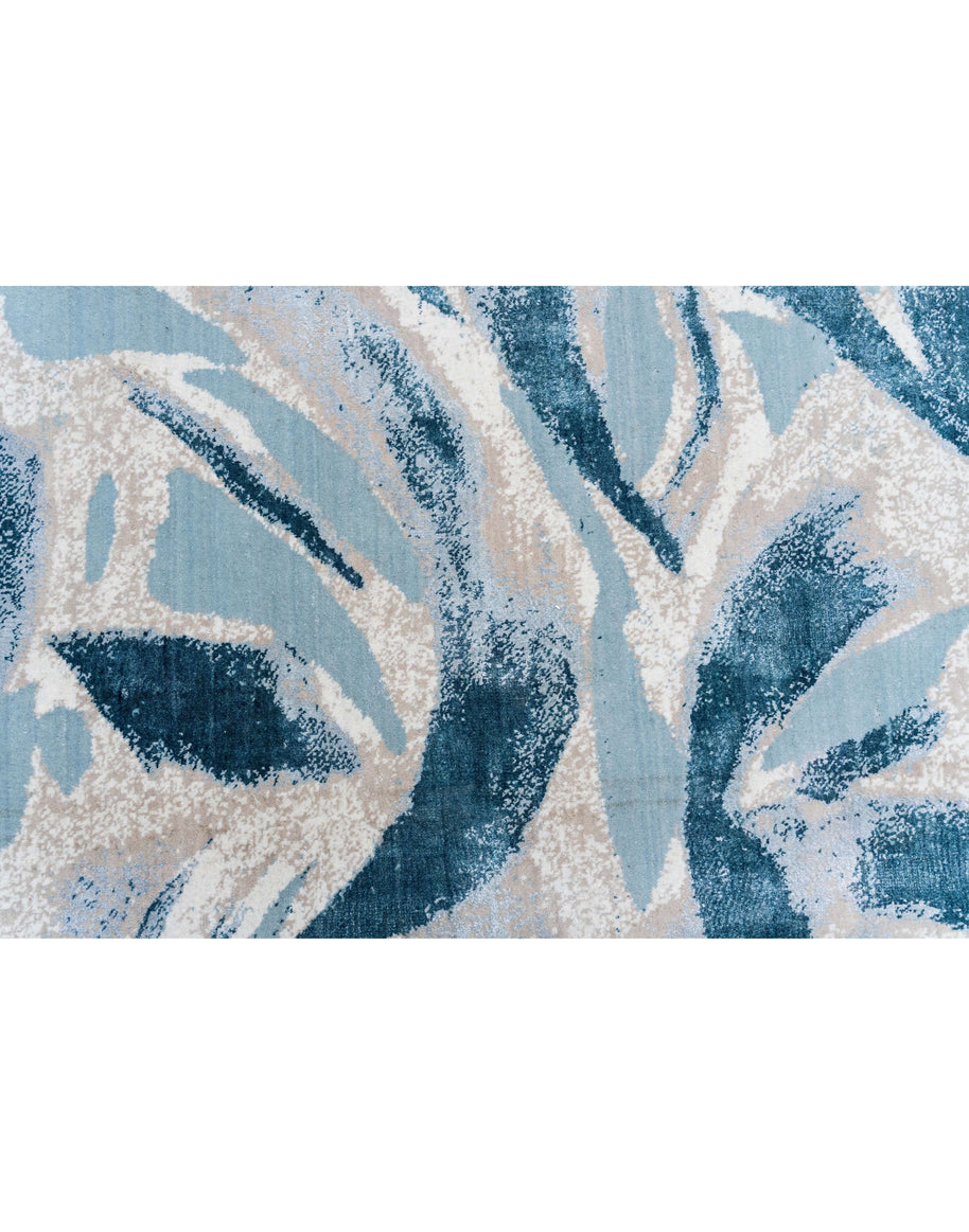 L O R E T O luxury handmade rug by Cherom in blue New Zealand wool with contemporary design.