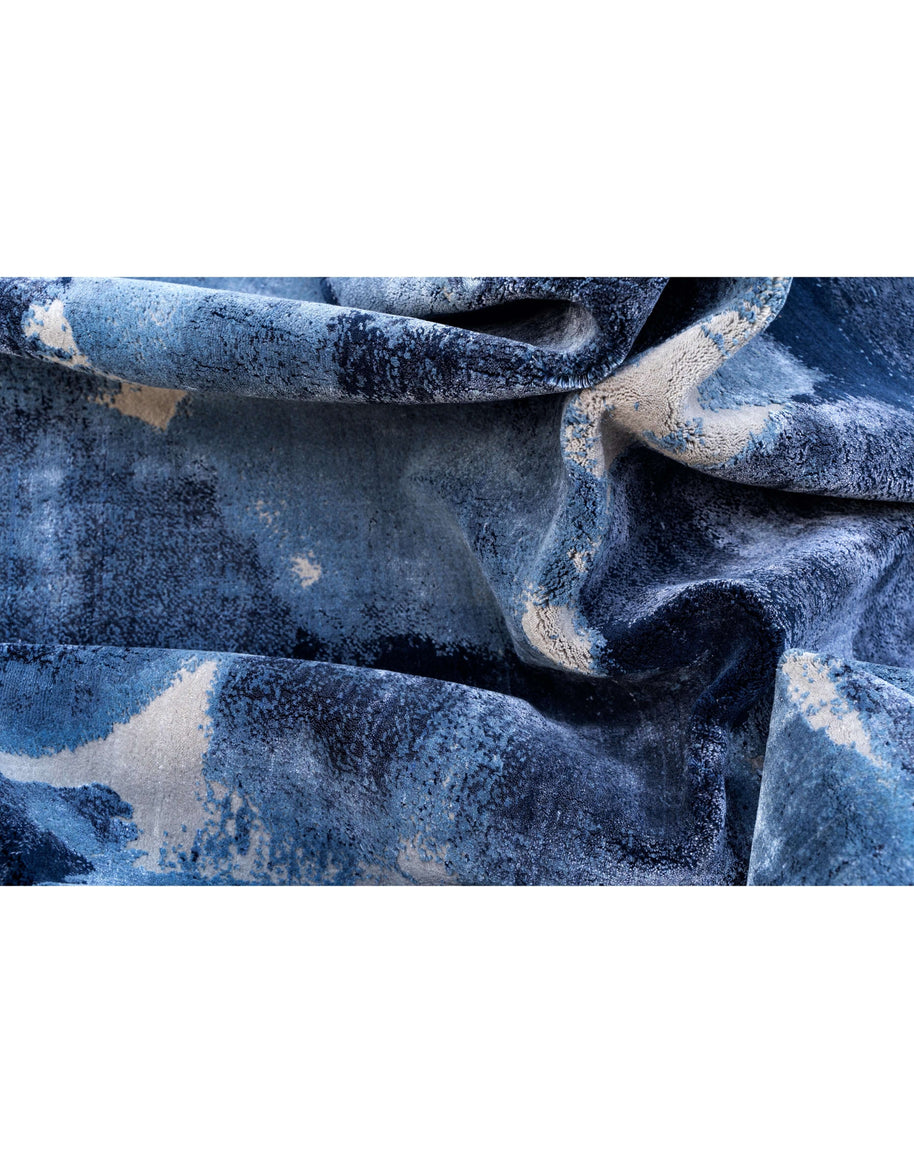 M A K luxury handmade rug by Cherom in blue, made from New Zealand wool and viscose.