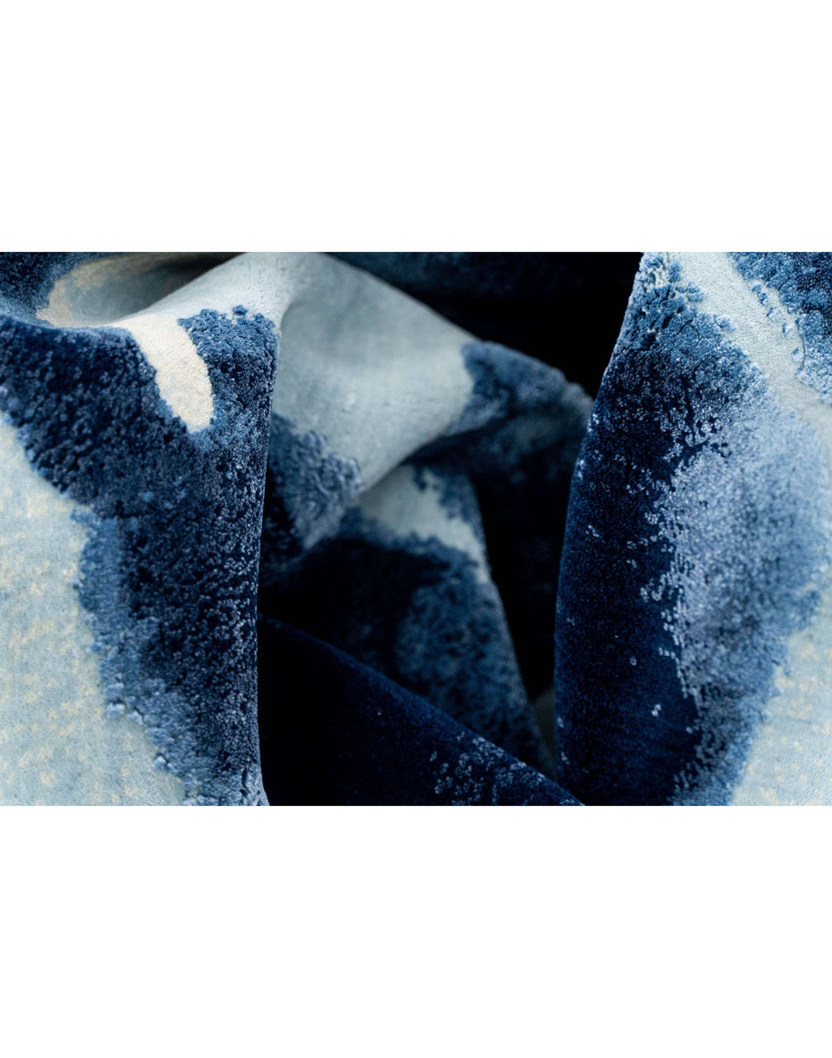 M A R L I luxury handmade rug by Cherom in blue wool and viscose fabric.