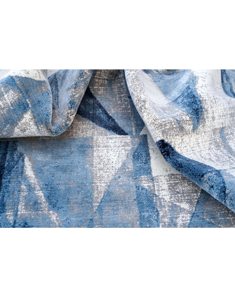 G E R A R D luxury handmade rug by Cherom in blue New Zealand wool with contemporary design.