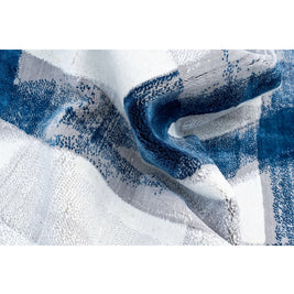 A S T O R I A luxury handmade rug by Cherom in blue tones, crafted from New Zealand wool.