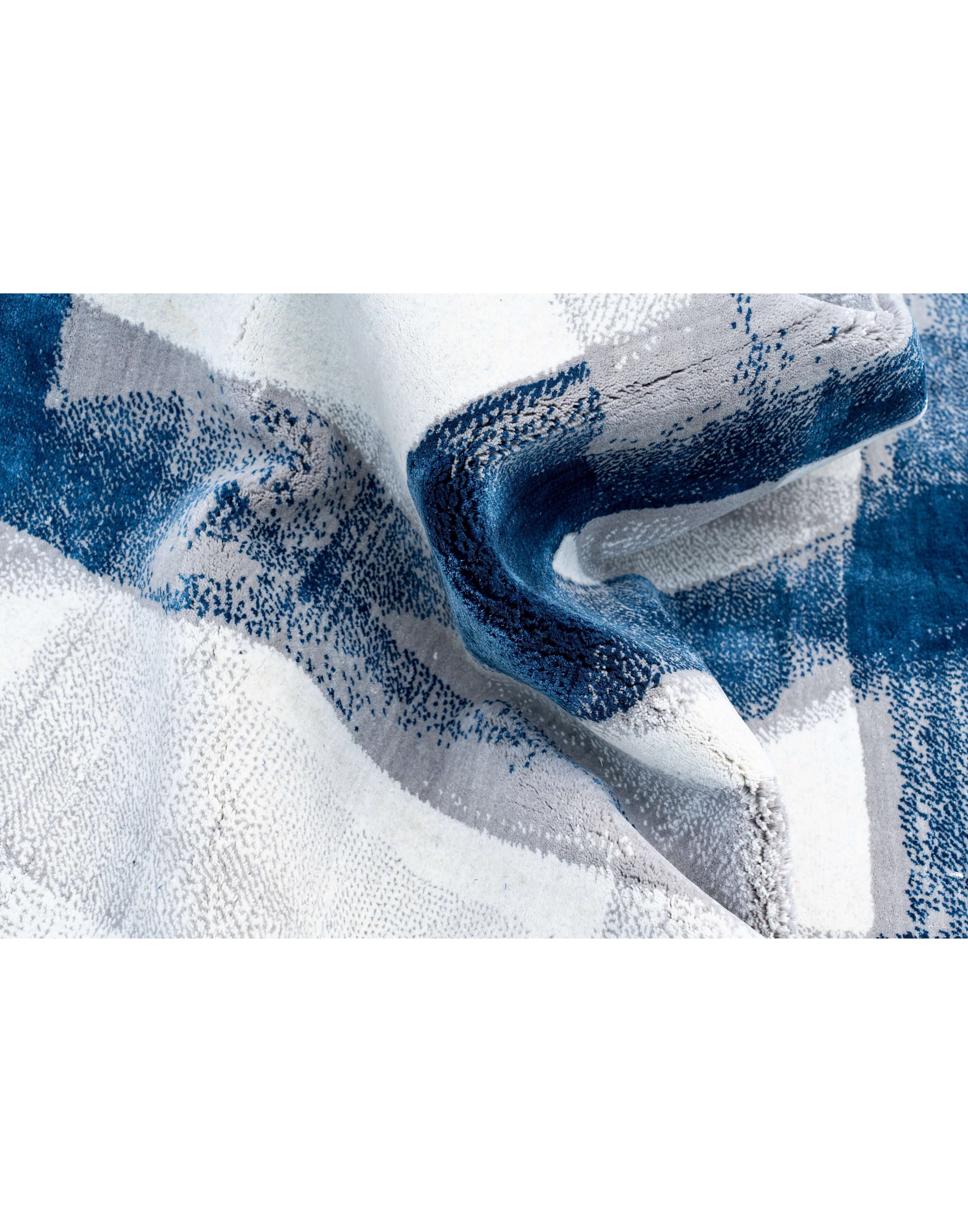 A S T O R I A luxury handmade rug by Cherom in blue tones, crafted from New Zealand wool.