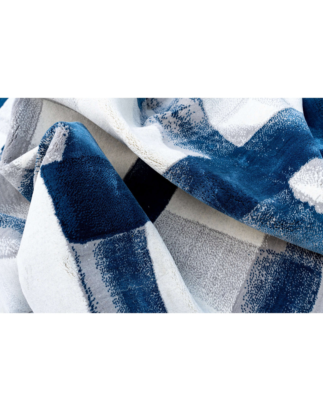 A S T O R I A luxury handmade rug by Cherom in navy and white New Zealand wool.