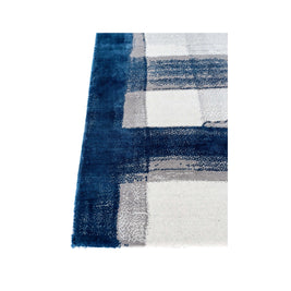 A S T O R I A luxury handmade rug by Cherom, featuring New Zealand wool in navy and white, contemporary design