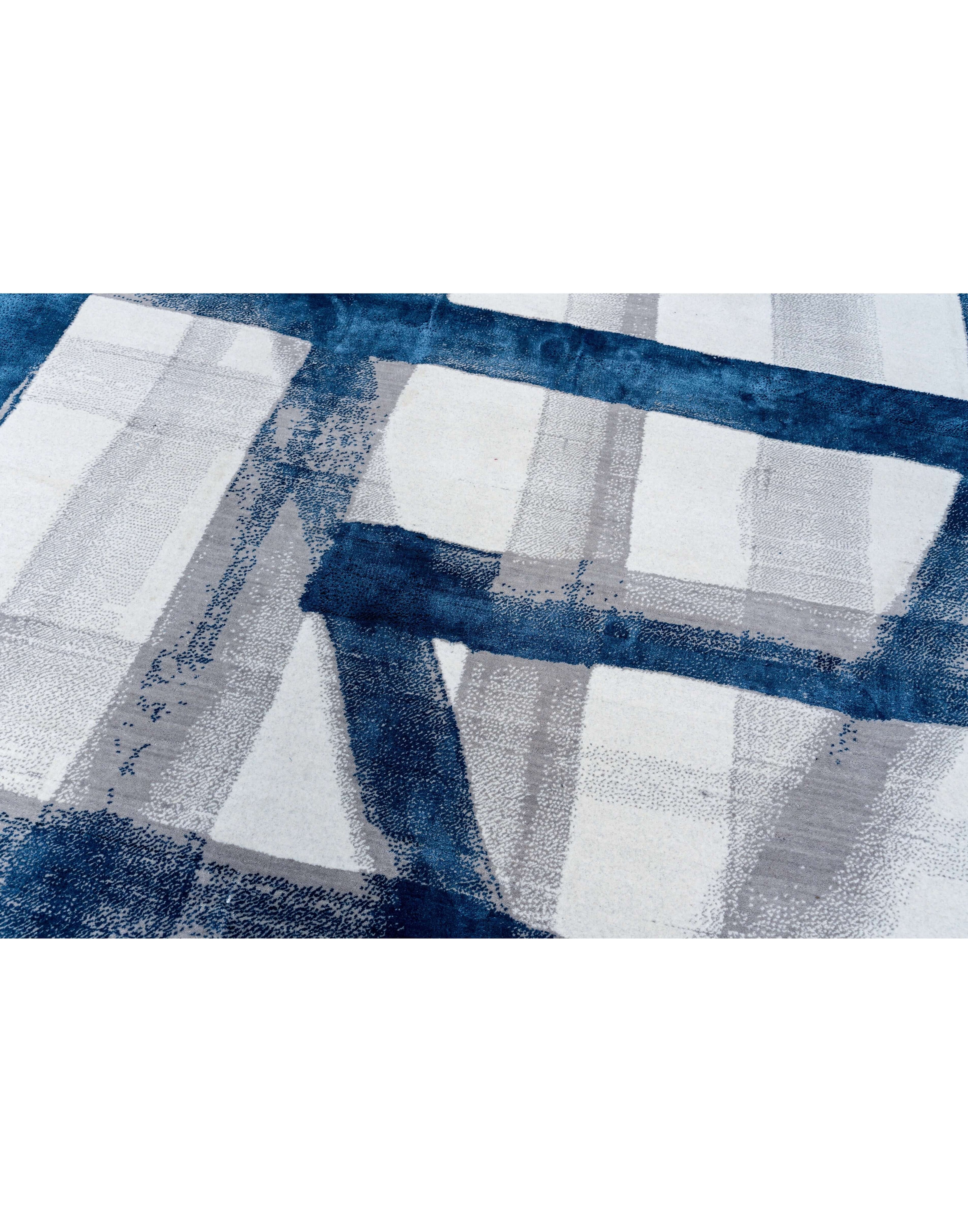 A S T O R I A luxury handmade rug by Cherom in blue and white New Zealand wool, modern contemporary design.