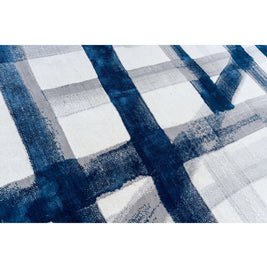 A S T O R I A luxury handmade rug by Cherom in navy and white New Zealand wool with contemporary design.
