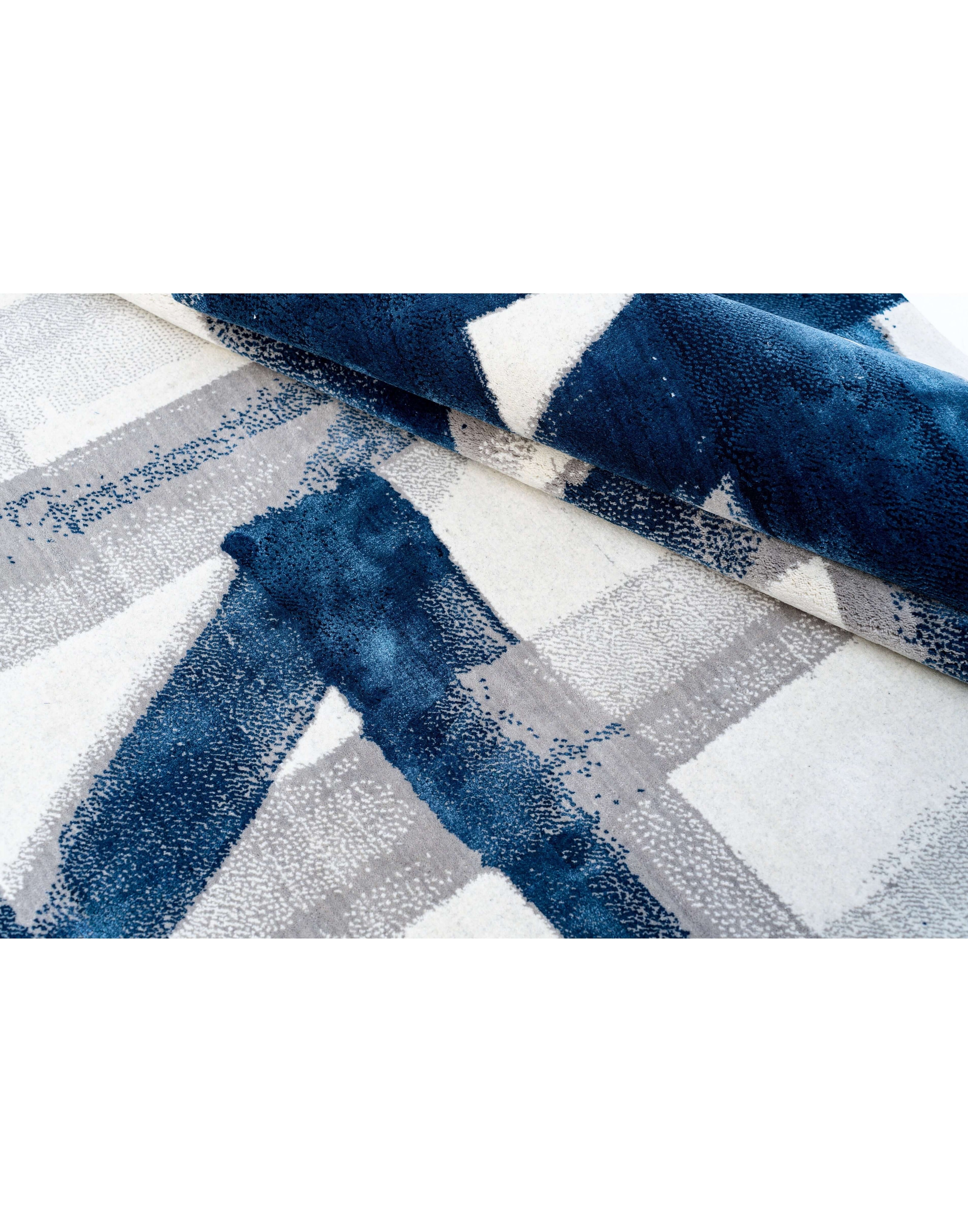 A S T O R I A luxury handmade rug by Cherom in blue and grey New Zealand wool.