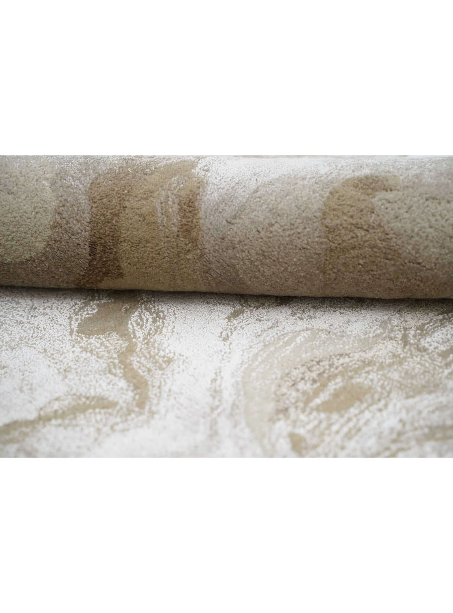 R I V E R S T O N E luxury handmade rug by Cherom in beige and taupe New Zealand wool, modern rug with elegant design.