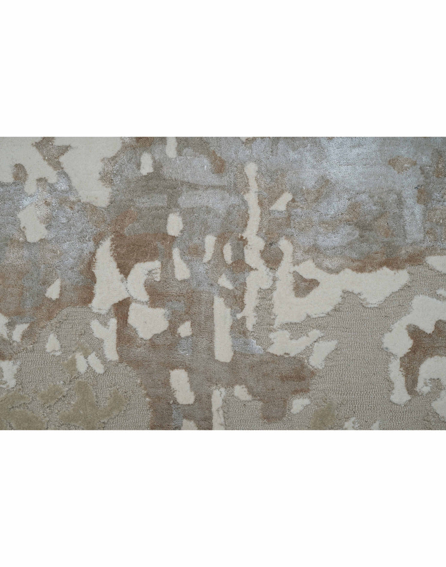 P E R E I R A luxury handmade rug by Cherom in beige wool and viscose.