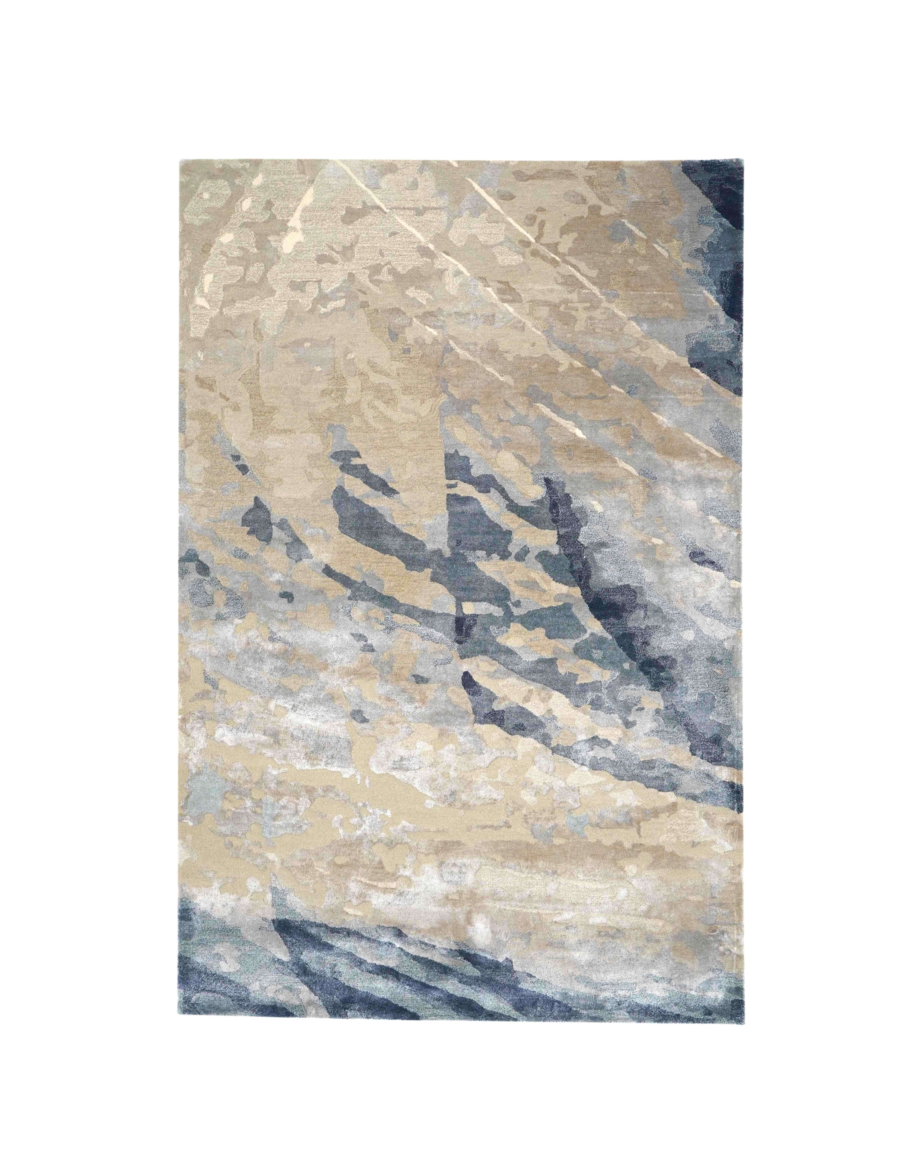 E V O K E luxury handmade rug by Cherom in New Zealand wool, showcasing abstract soft greys and muted blues.