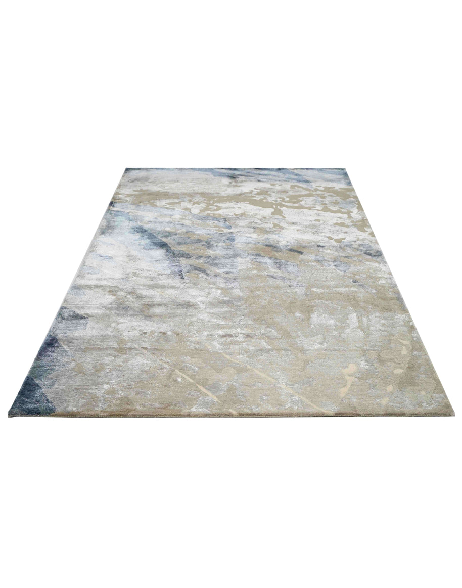 E V O K E luxury handmade rug by Cherom in greys and blues, New Zealand wool, contemporary design.