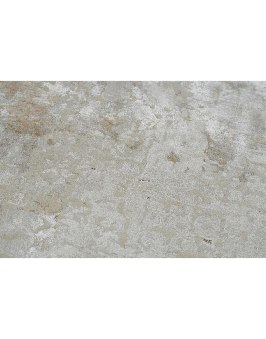 B Y R O N luxury handmade rug by Cherom in ivory and beige tones, crafted from New Zealand wool.