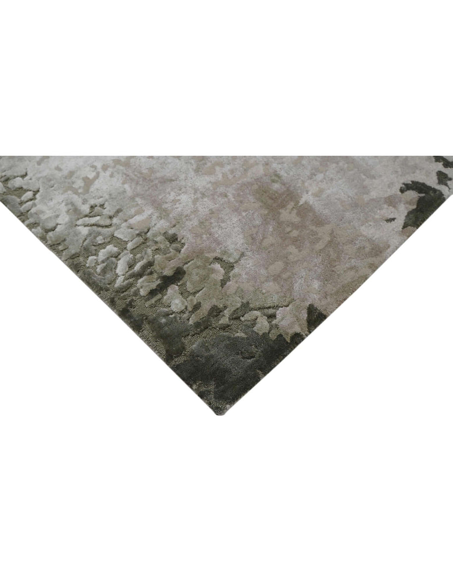 M O S S luxury handmade rug by Cherom in earthy greens and stone greys.