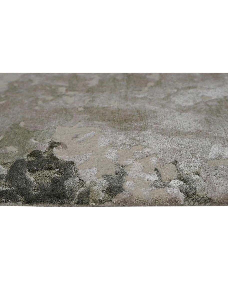 M O S S luxury handmade rug by Cherom in earthy greens and stone grey, crafted from New Zealand wool.