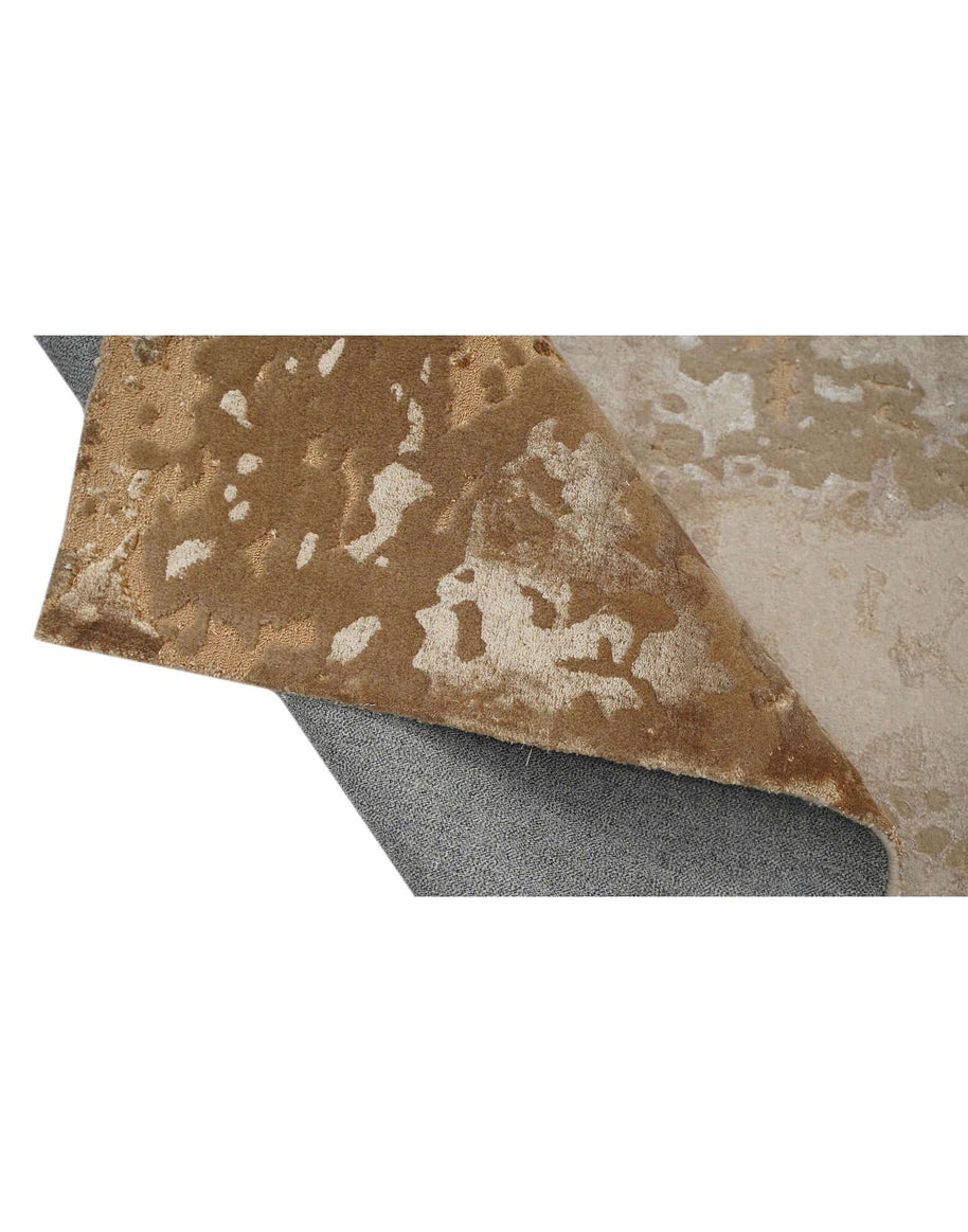 C A R M E L luxury handmade rug by Cherom in bronze and taupe, crafted from New Zealand wool.