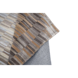 B A S K luxury handmade rug by Cherom in New Zealand wool, rich brown and beige tones.