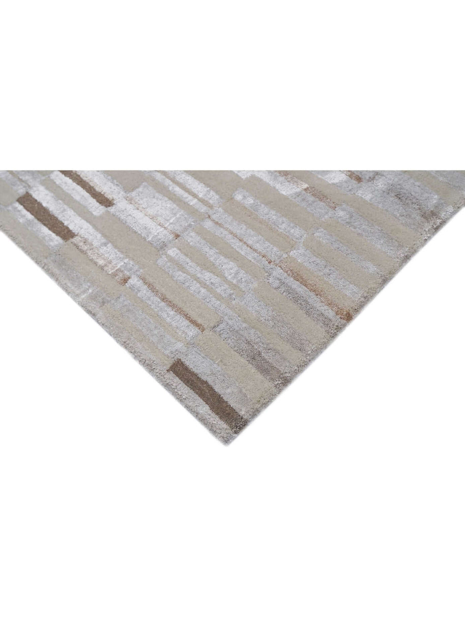 B A S K luxury handmade rug by Cherom in New Zealand wool, beige and brown colors.
