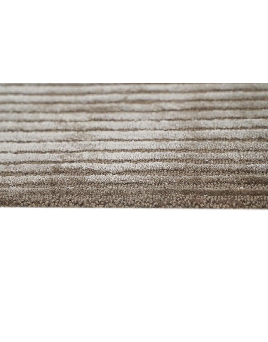 C O N T O U R - P R I S M luxury handmade rug by Cherom in soft sandy New Zealand wool.
