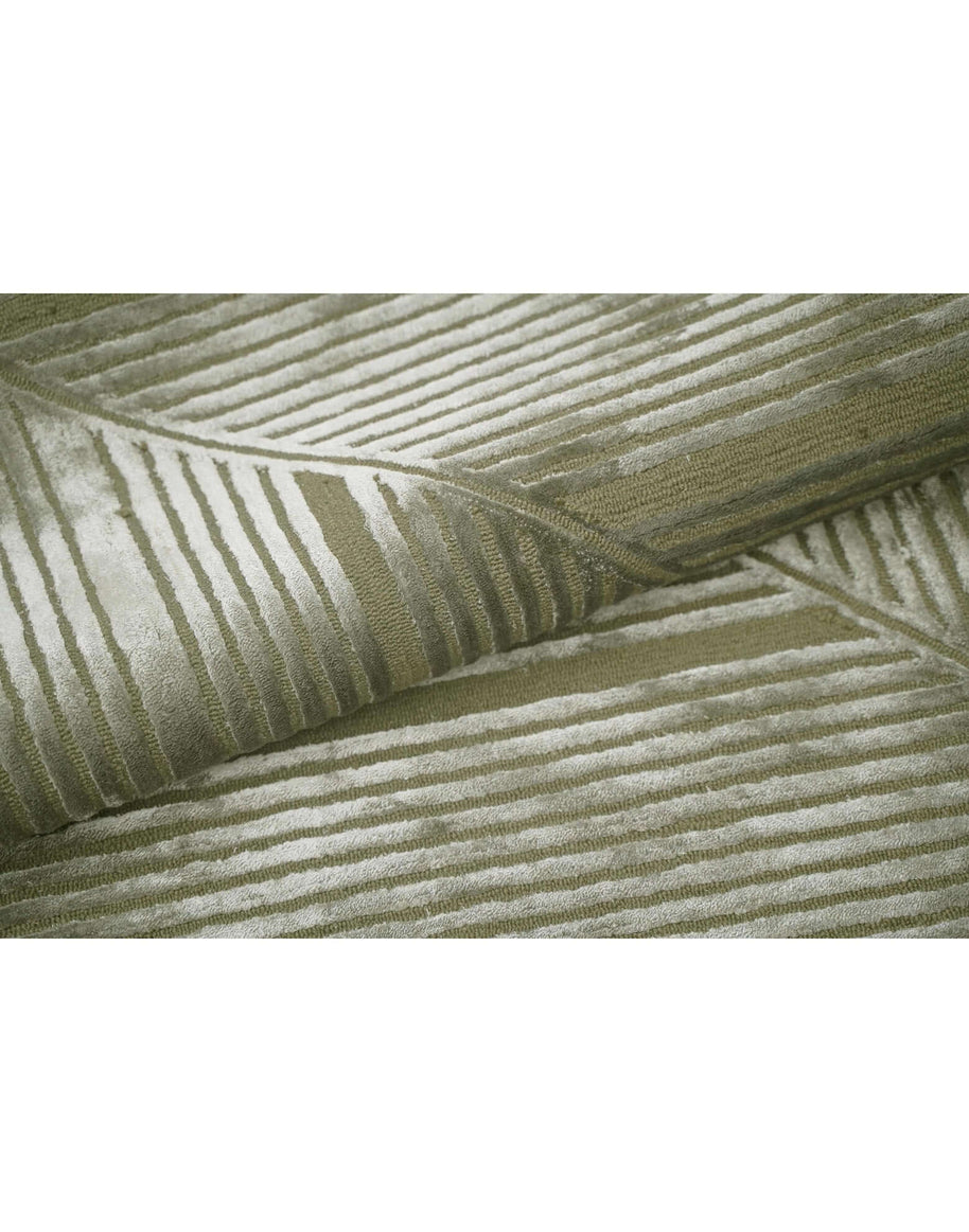 C O N T O U R - L I R A luxury handmade rug by Cherom in olive and sage New Zealand wool with modern design.