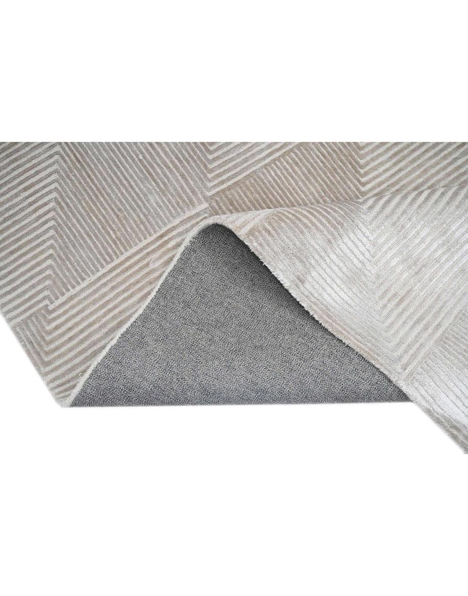 C O N T O U R - R A V E L L O luxury handmade rug by Cherom, light beige New Zealand wool, modern design.