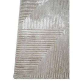 C O N T O U R - R A V E L L O luxury handmade rug by Cherom in light beige New Zealand wool.