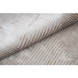 C O N T O U R - R A V E L L O luxury handmade rug by Cherom in light beige New Zealand wool with contemporary design.