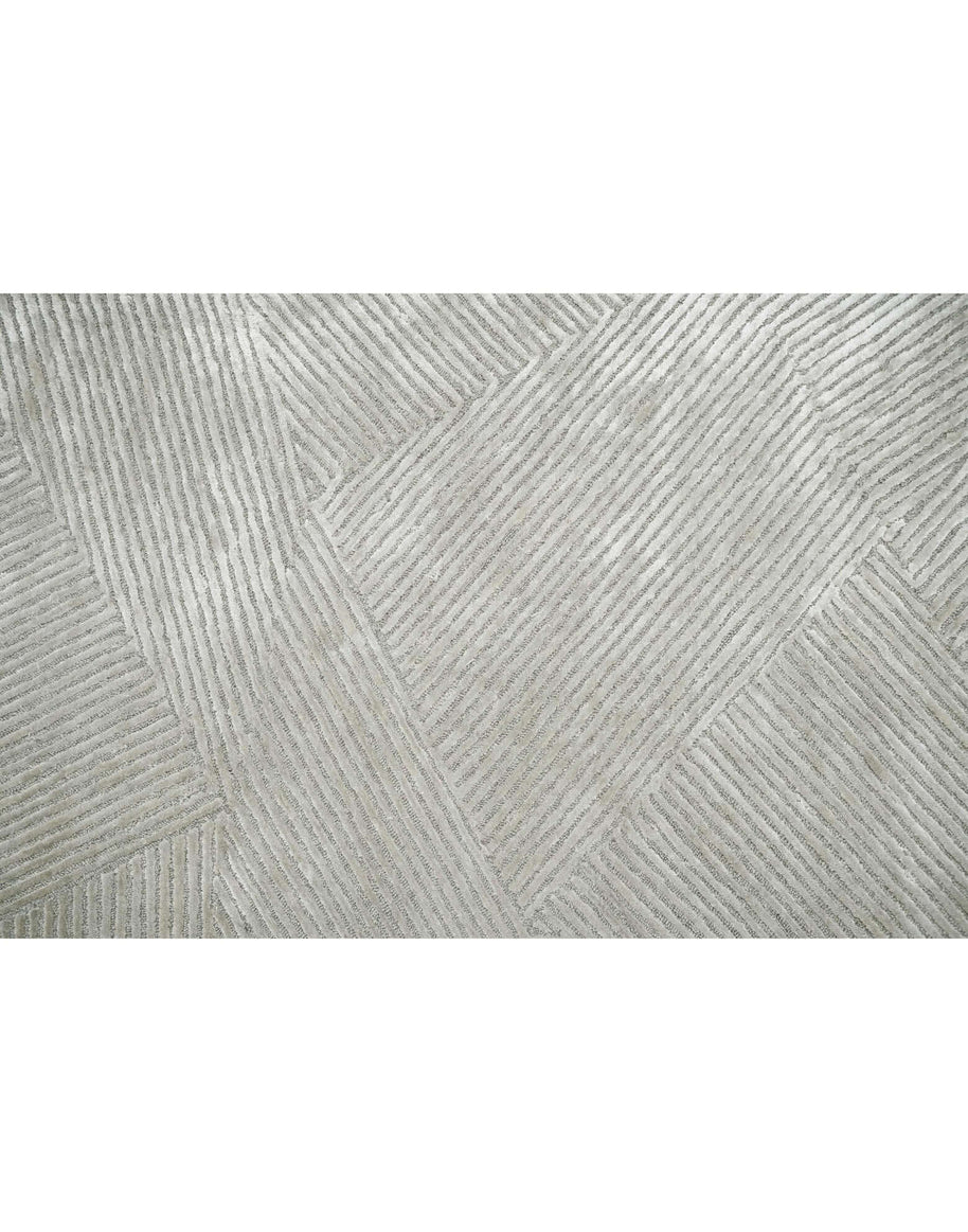 C O N T O U R - T E S S A R A luxury handmade rug by Cherom in soft grey New Zealand wool.