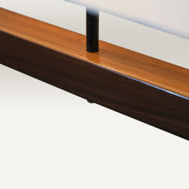 Elegant pendant light with warm, diffused lighting and a touch of natural texture.