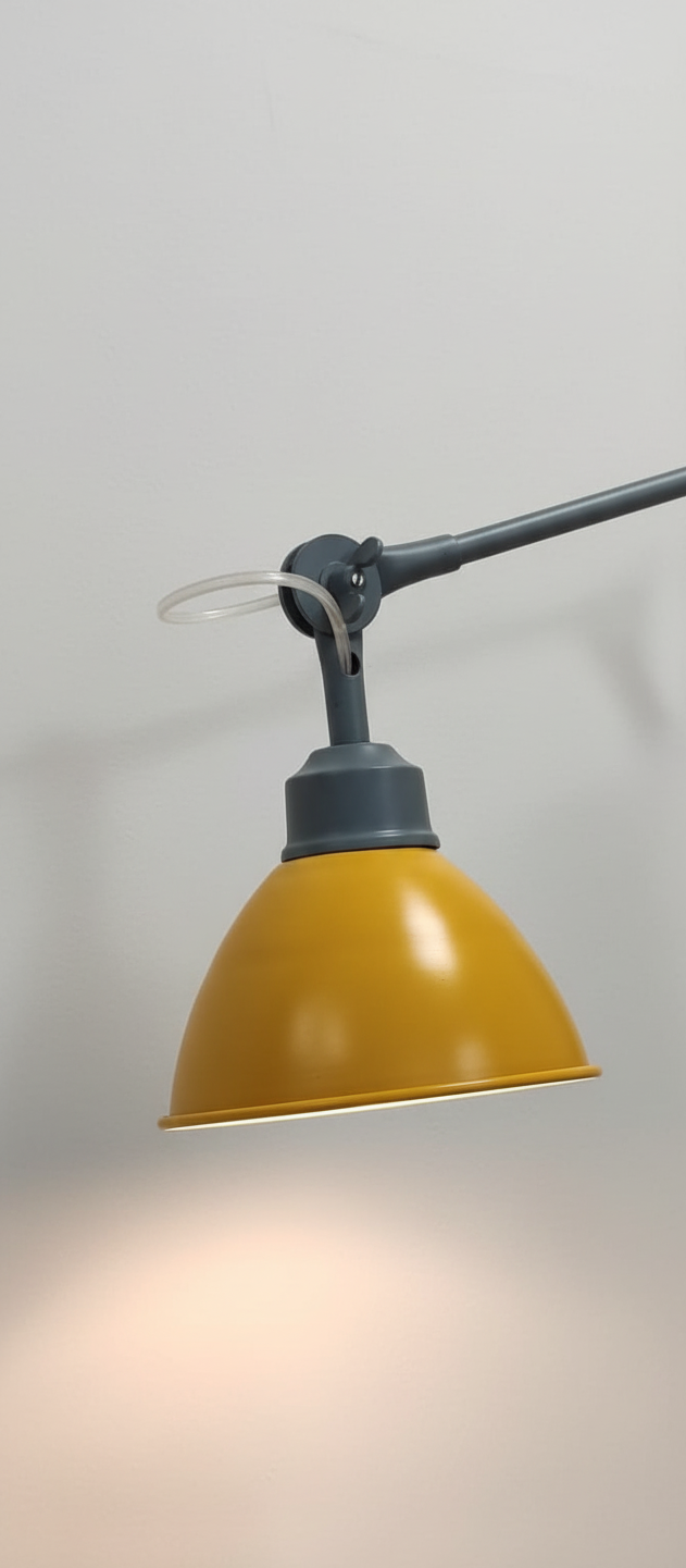 A Yellow & Grey Swing-Arm Wall Mounted Light