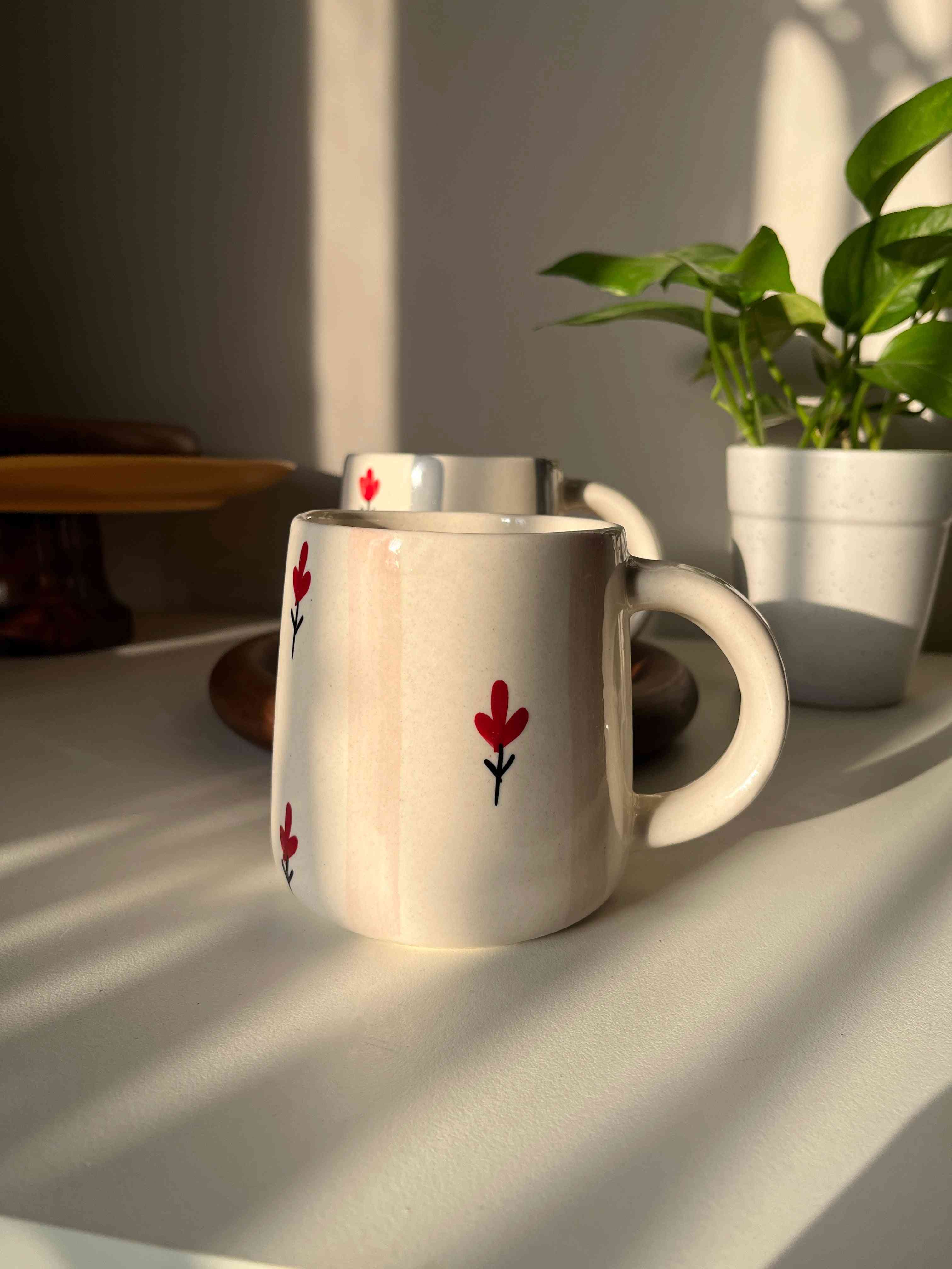 Pink stripe on white base with red floral motif ceramic mug for coffee, tea and breaks. Home decor, collector. 