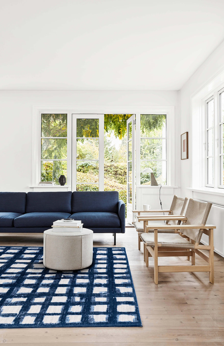 E V I A N luxury handmade rug by Cherom in navy and white New Zealand wool, modern design.