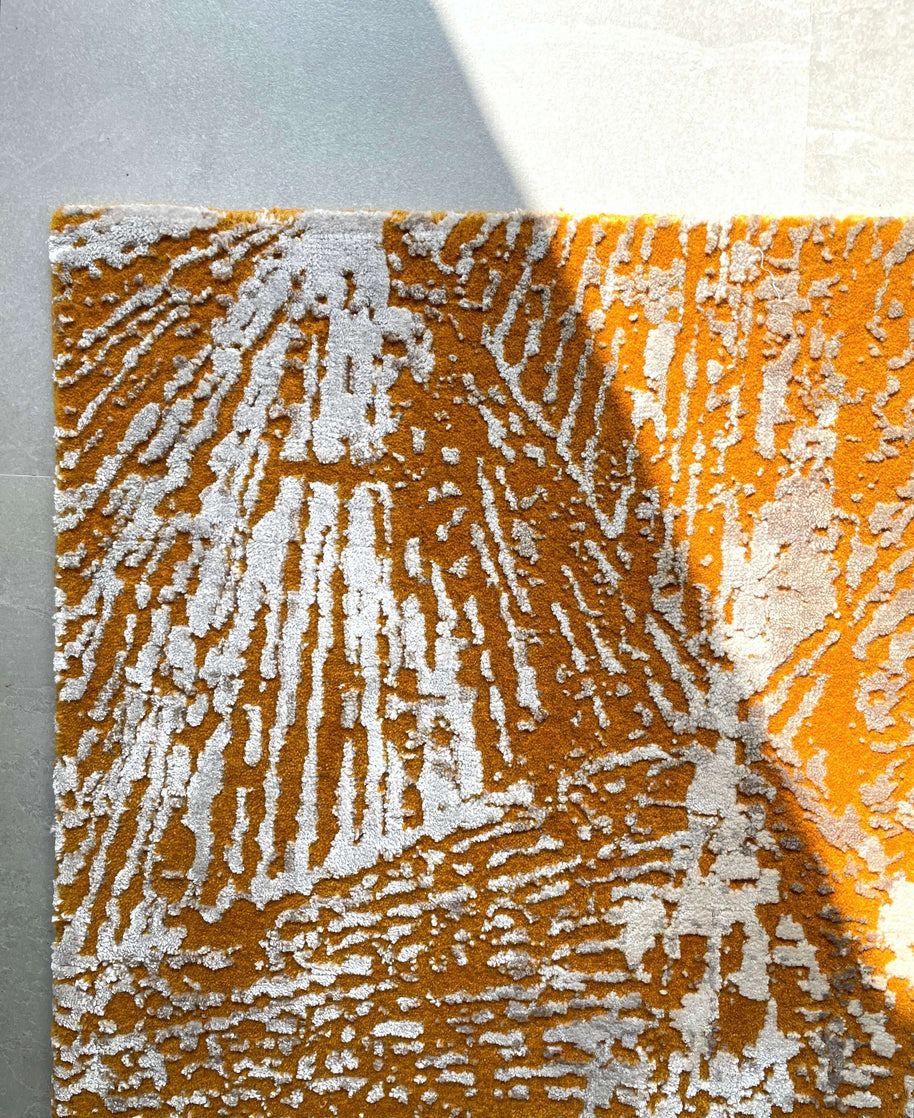 M A R C U S luxury handmade rug by Cherom in orange New Zealand wool with contemporary design