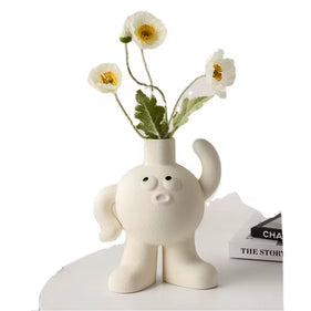 Big feet Flower vase scratching the head - https://artecasa.in/