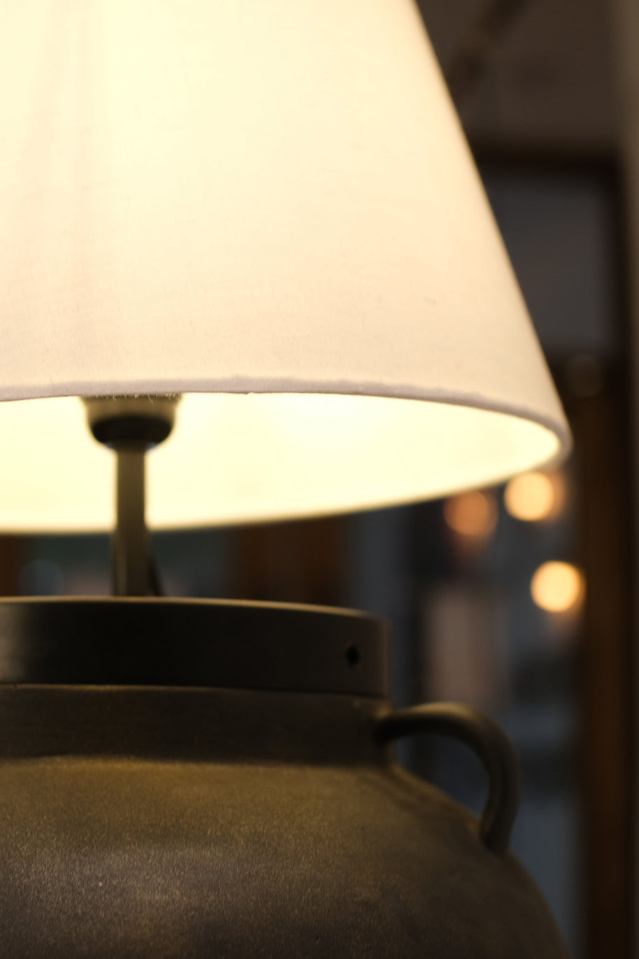 Modern table lamp with a desert-themed design, blending natural textures and soft illumination