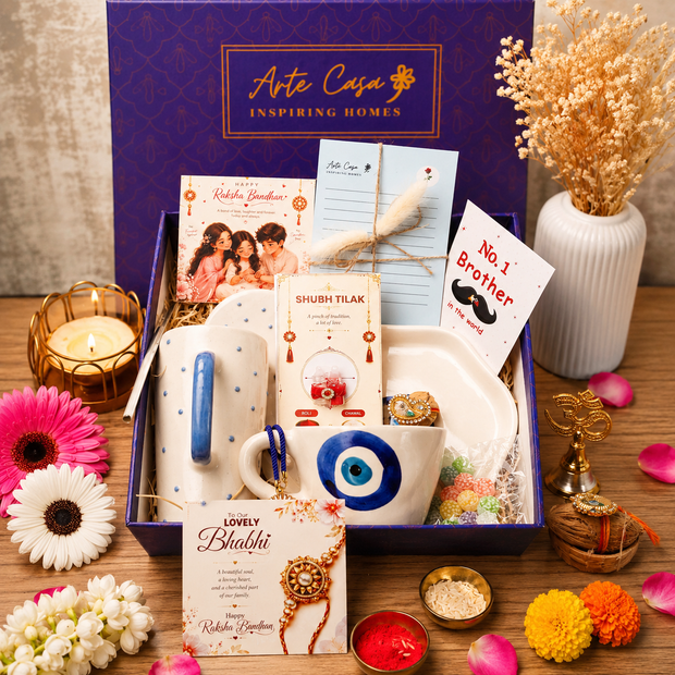Artecasa Nazar Se Surakshit Rakhi Hamper | Evil Eye Rakhi Gift for Brother & Bhabhi - https://artecasa.in/
