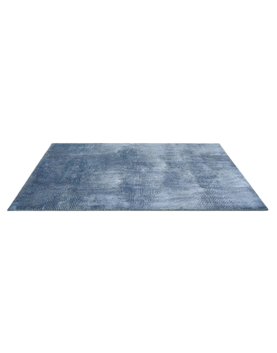 C O N T O U R - V E D E Z luxury handmade rug by Cherom, rich indigo New Zealand wool, modern geometric design.