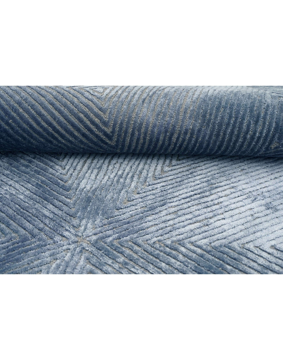 C O N T O U R - V E D E Z luxury handmade rug by Cherom, rich indigo New Zealand wool, modern design.