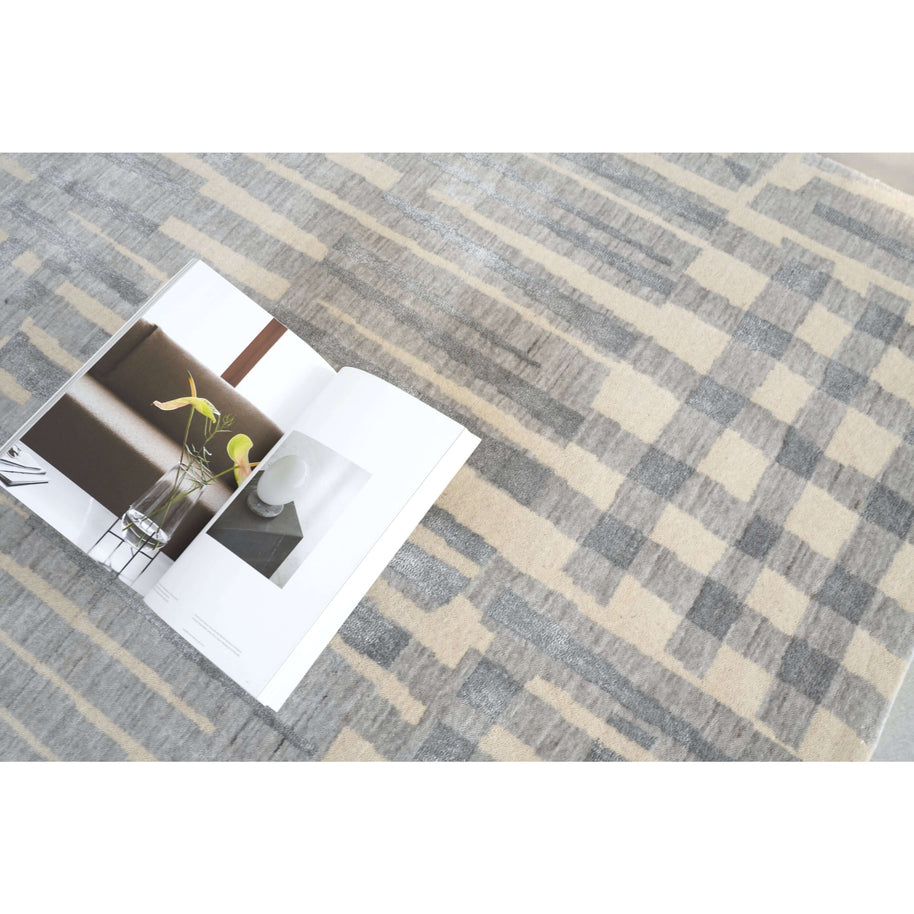 D E L M A R luxury handmade rug by Cherom, New Zealand wool in gray and cream.