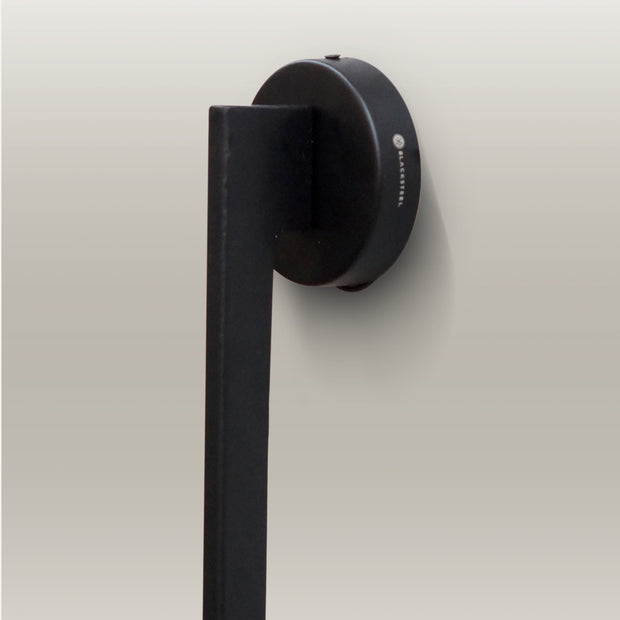 Sleek black LED wall lamp providing soft, energy-efficient lighting, perfect for contemporary interiors