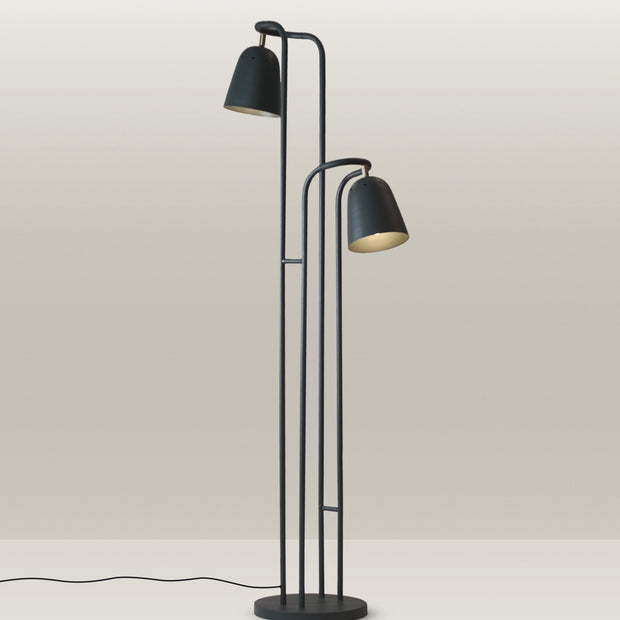 Sleek black floor lamp with two adjustable heads, perfect for modern luxury homes.