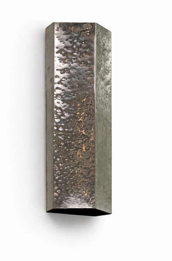 Metallic wall sconce with textured surface on a white background