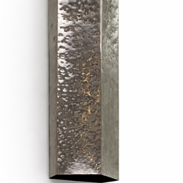 Metallic wall sconce with textured surface on a white background