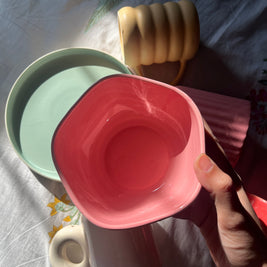 Organic-shaped ceramic bowl with glossy glaze